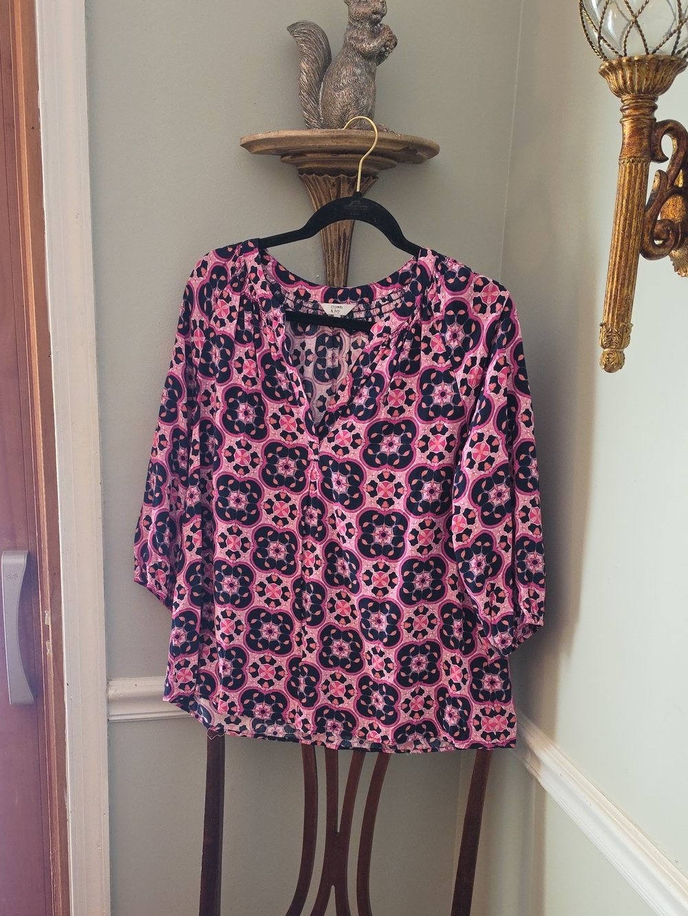 Crown & Ivy 3/4-sleeve blouse featuring a vibrant pink and navy geometric floral